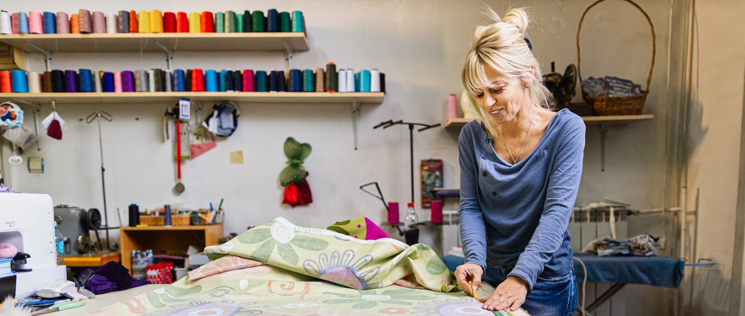 quilting business owner sewing fabric