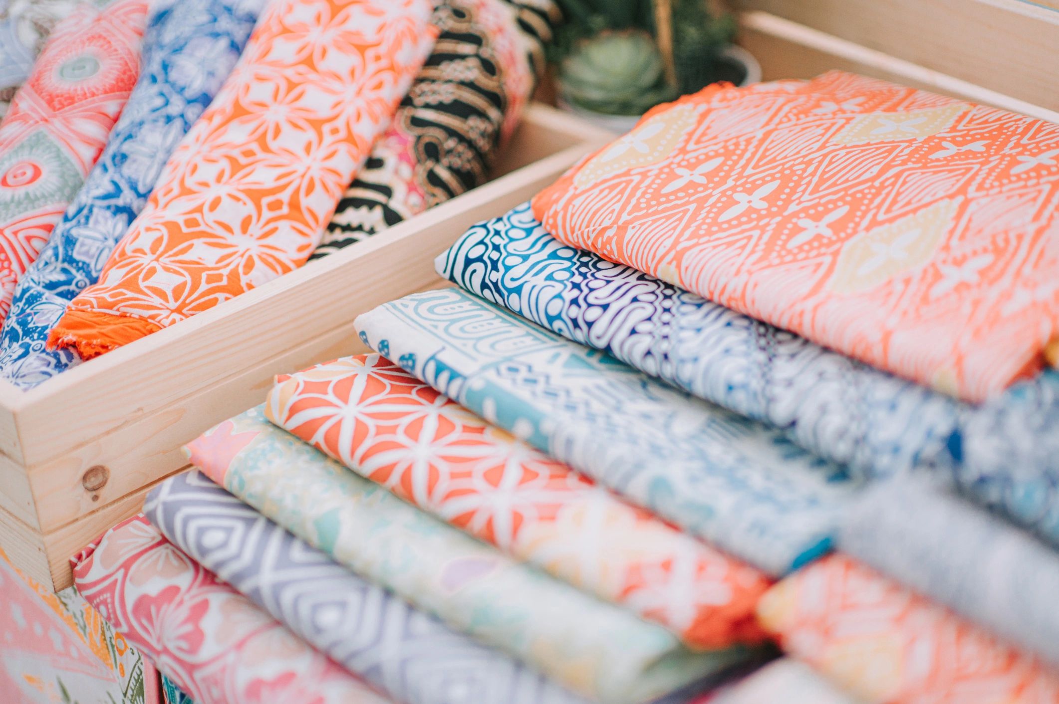 colorful handmade quilts display