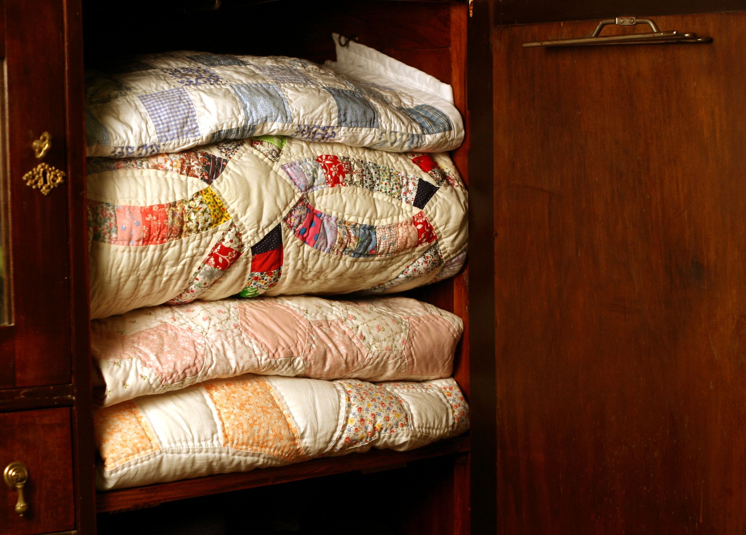 Hand-stitched quilt with detailed patterns